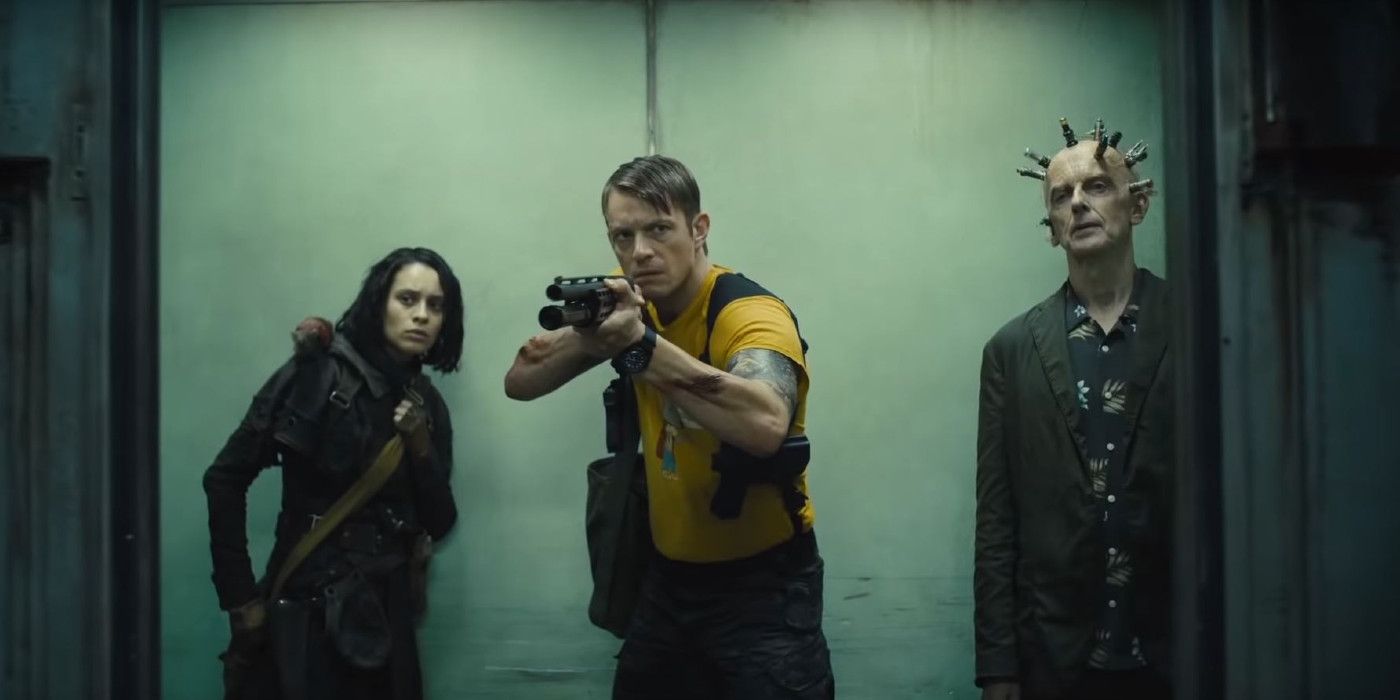 An image of Ratcatcher 2, Rick Flag, and The Thinker standing together in The Suicide Squad
