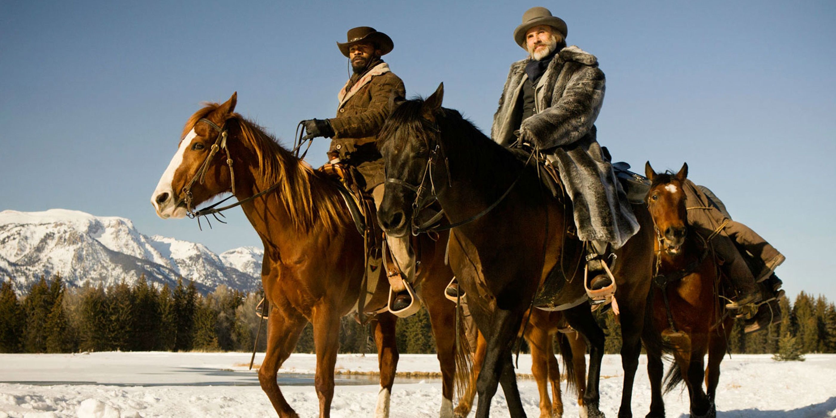 Django and Dr Schultz riding horses in Django Unchained
