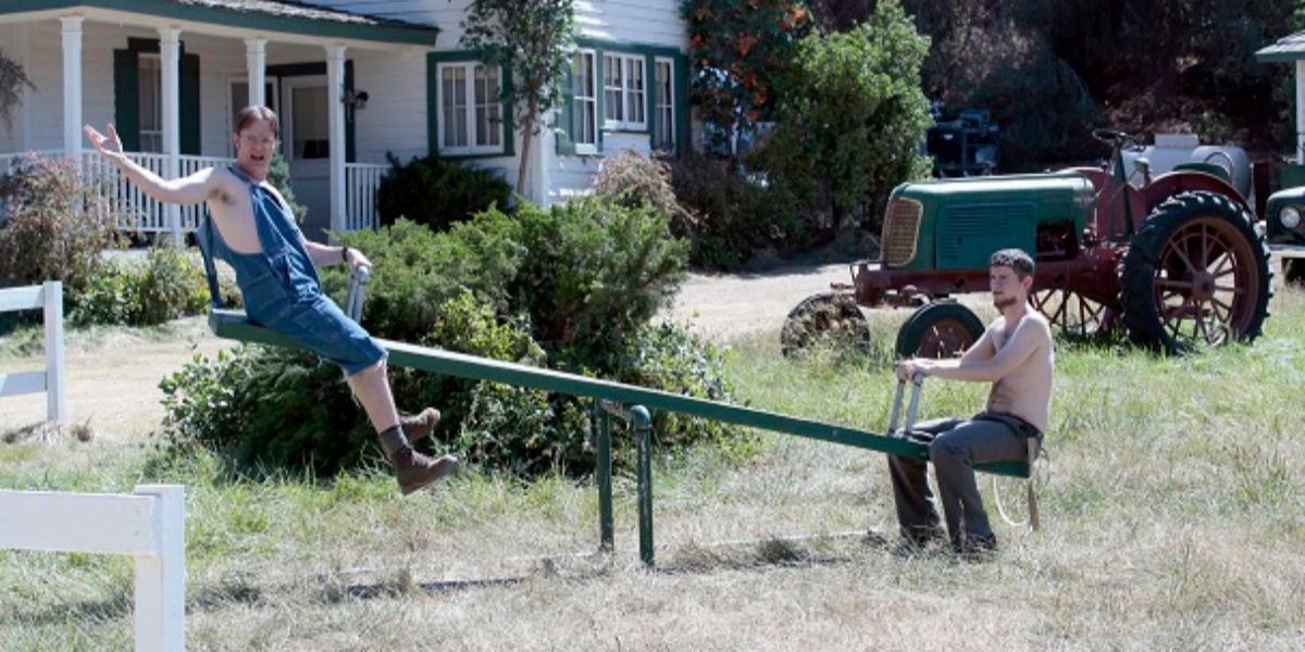 Dwight and Mose on a seesaw