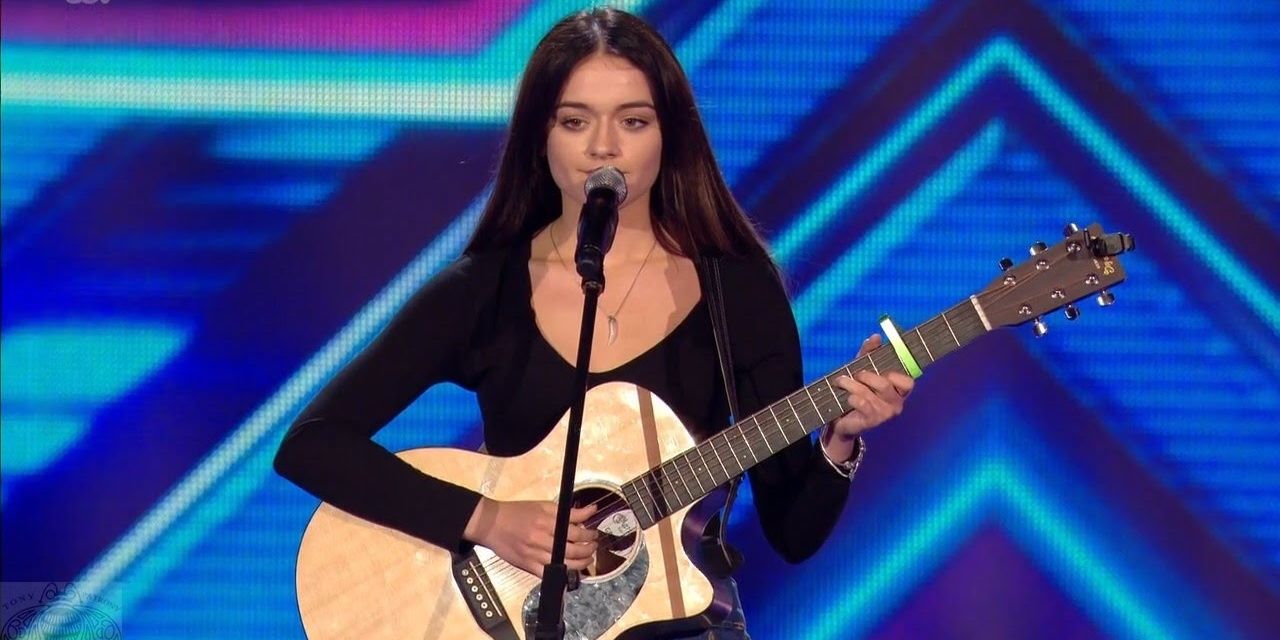Emily Middlemas plays a guitar in X-factor