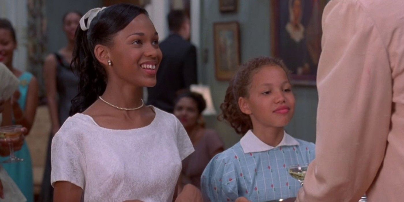 Two young girls smile in Eve's Bayou