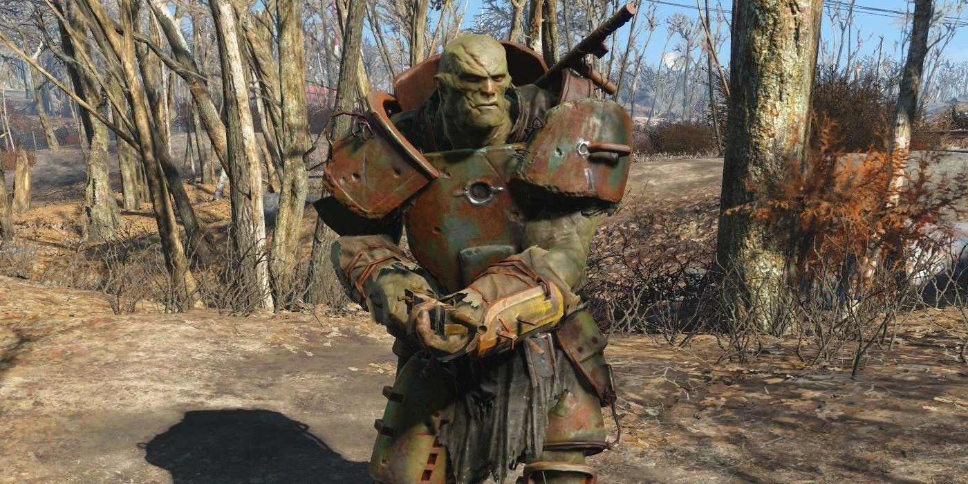 Um super mutante parado na floresta em Fallout.