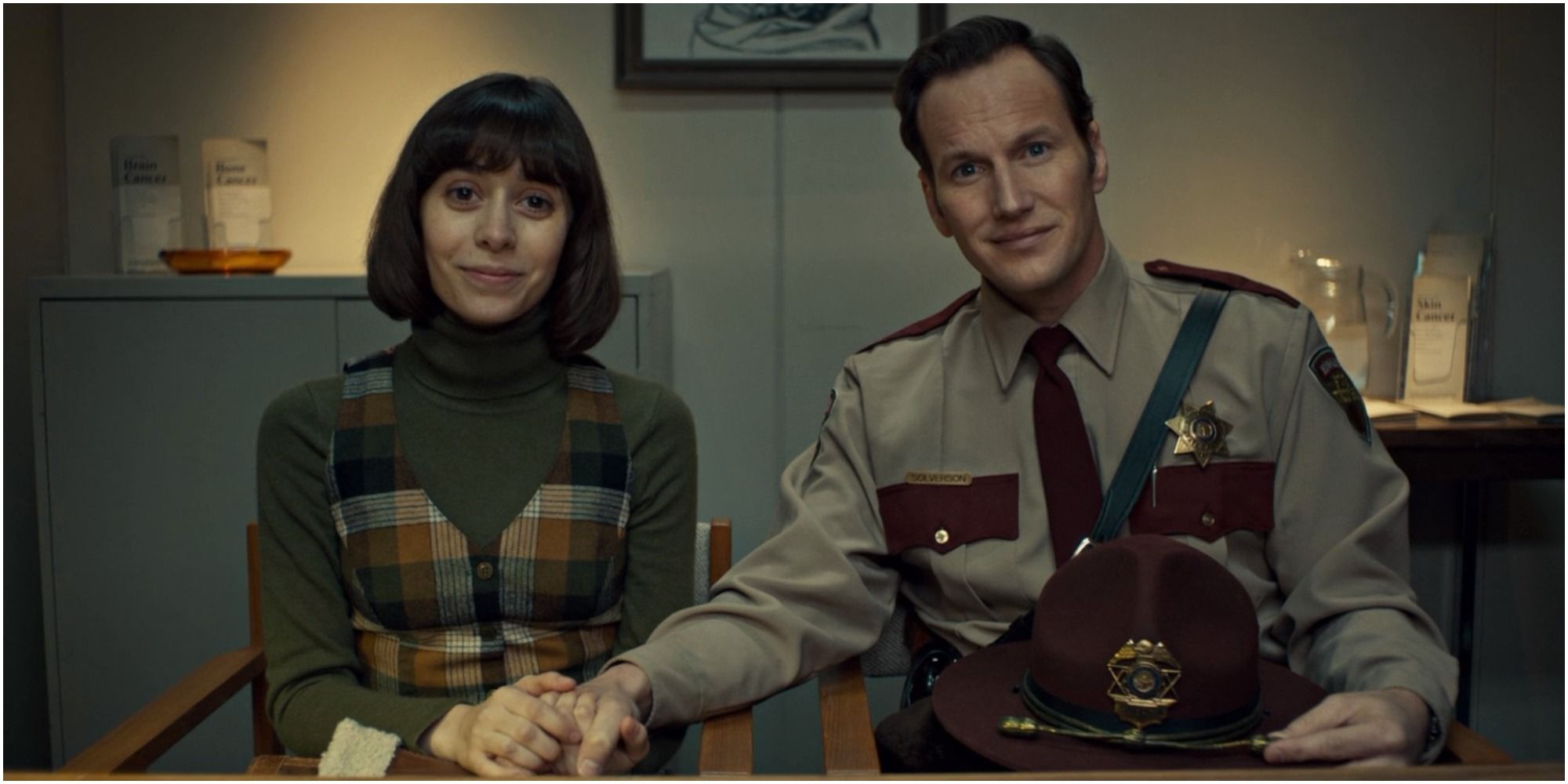 A screenshot of Betsy and Lou Solverson consoling each other in Fargo