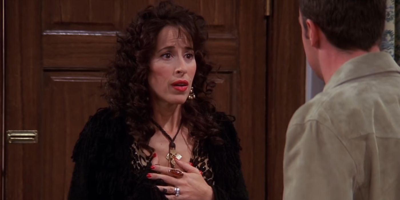Janice talking to Chandler with a shocked expression on her face in Friends