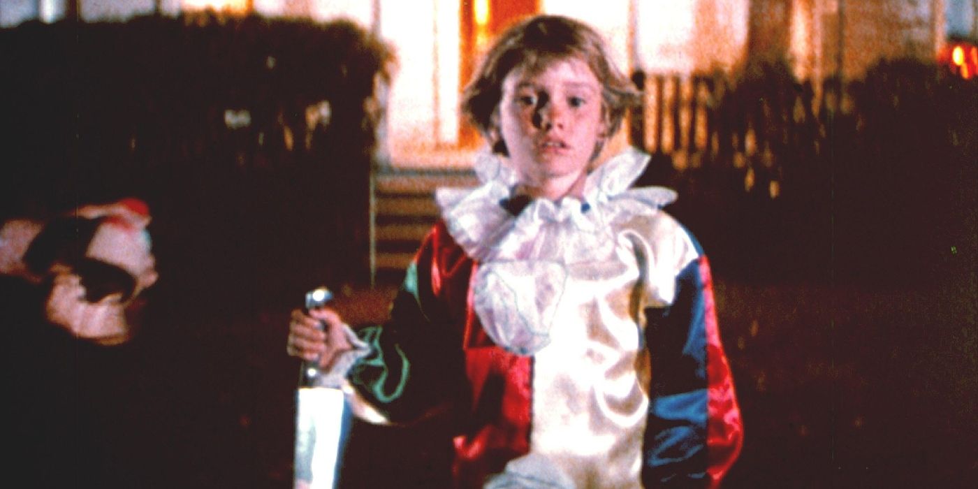 Michael Myers as a kid holding a knife in Halloween