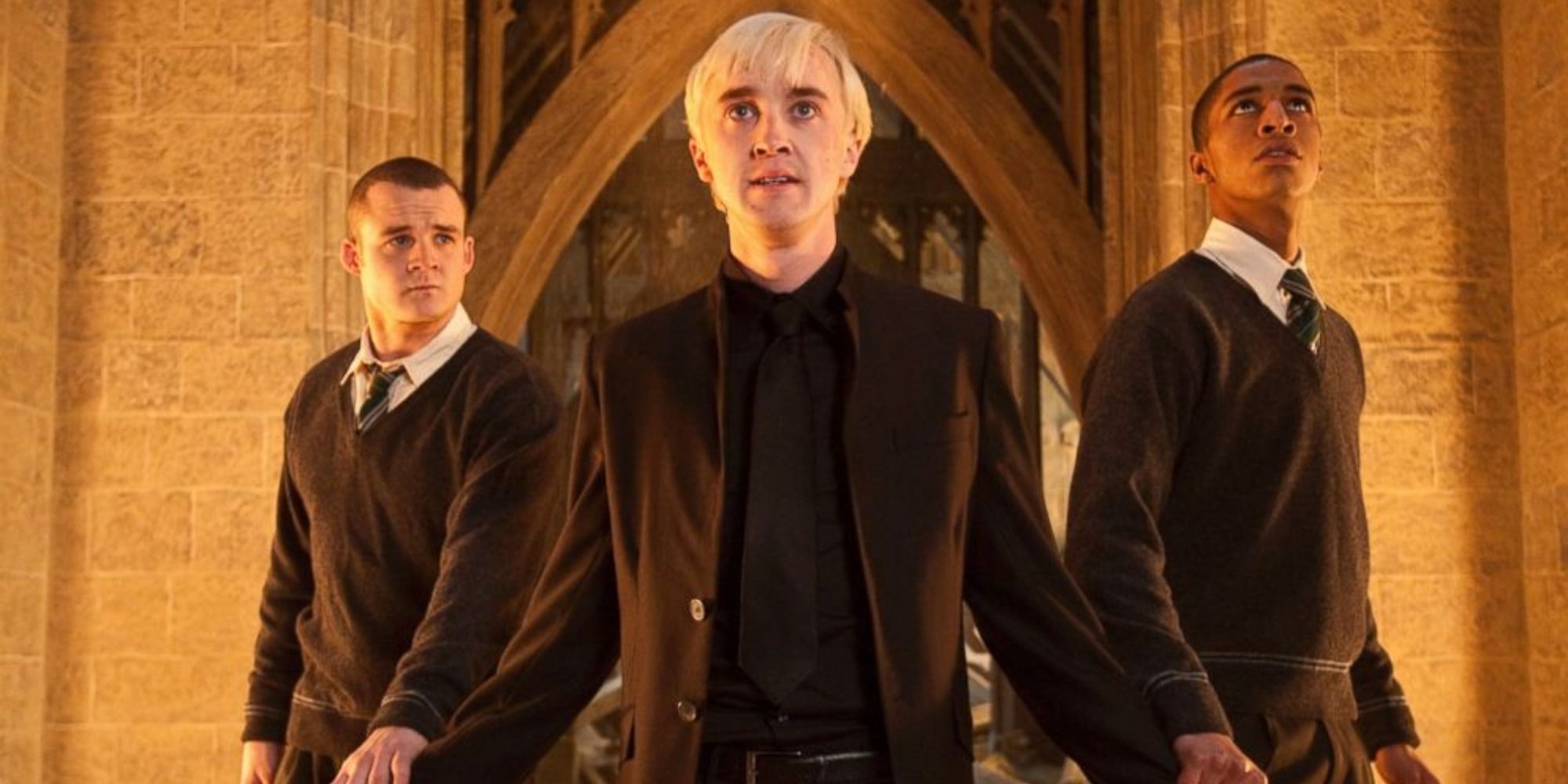 A screenshot of Draco Malfoy, Gregory Goyle and Blaise Zabini stumbling upon the Room of Requirement in Harry Potter and the Deathly Hallows - Part 2