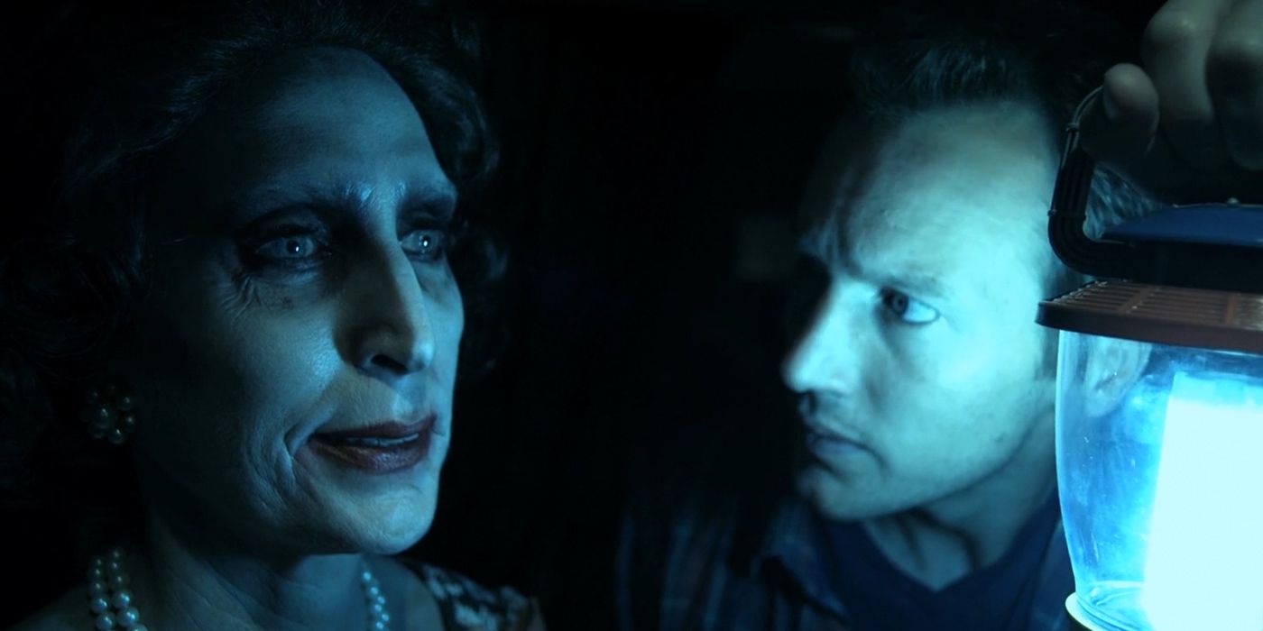 Patrick Wilson inspecting someone from The Further in Insidious