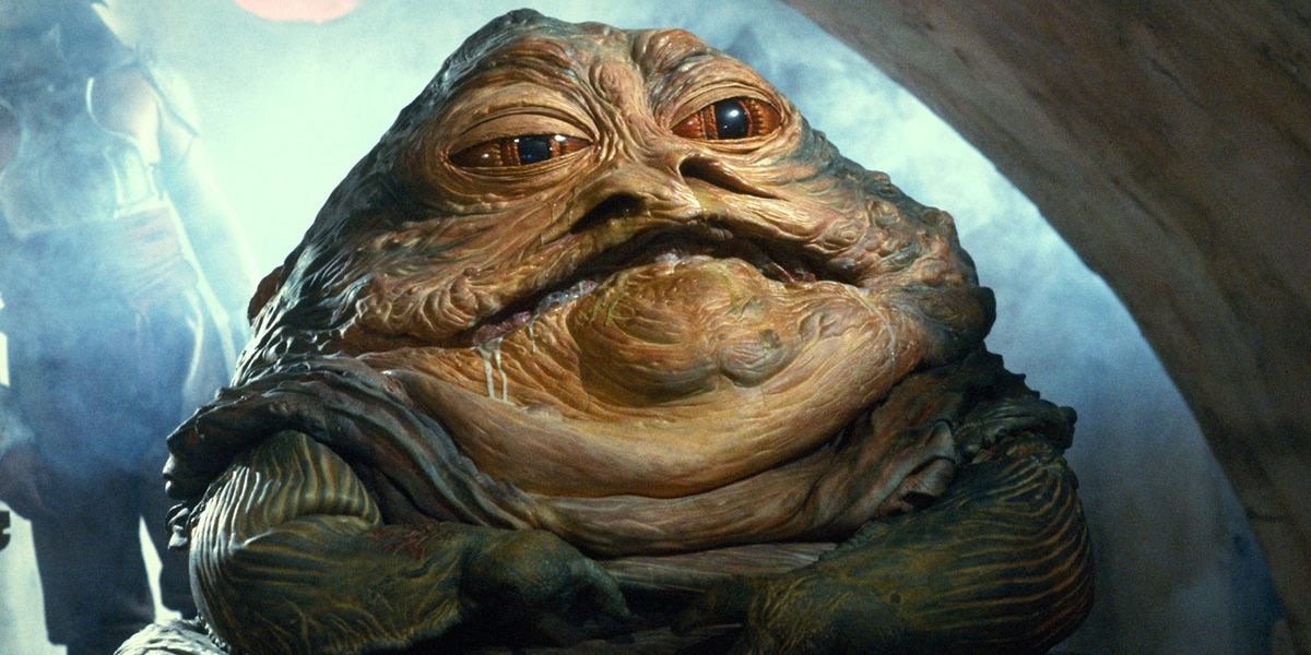 Jabba the Hutt sitting in his palace in Return of the Jedi