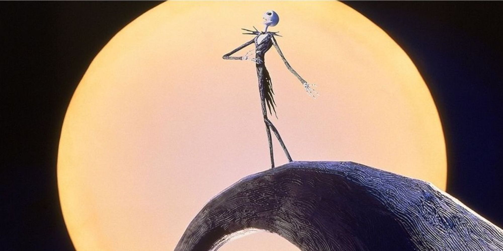 Jack Skellington on a hill silhouetted by the moon in The Nightmare Before Christmas