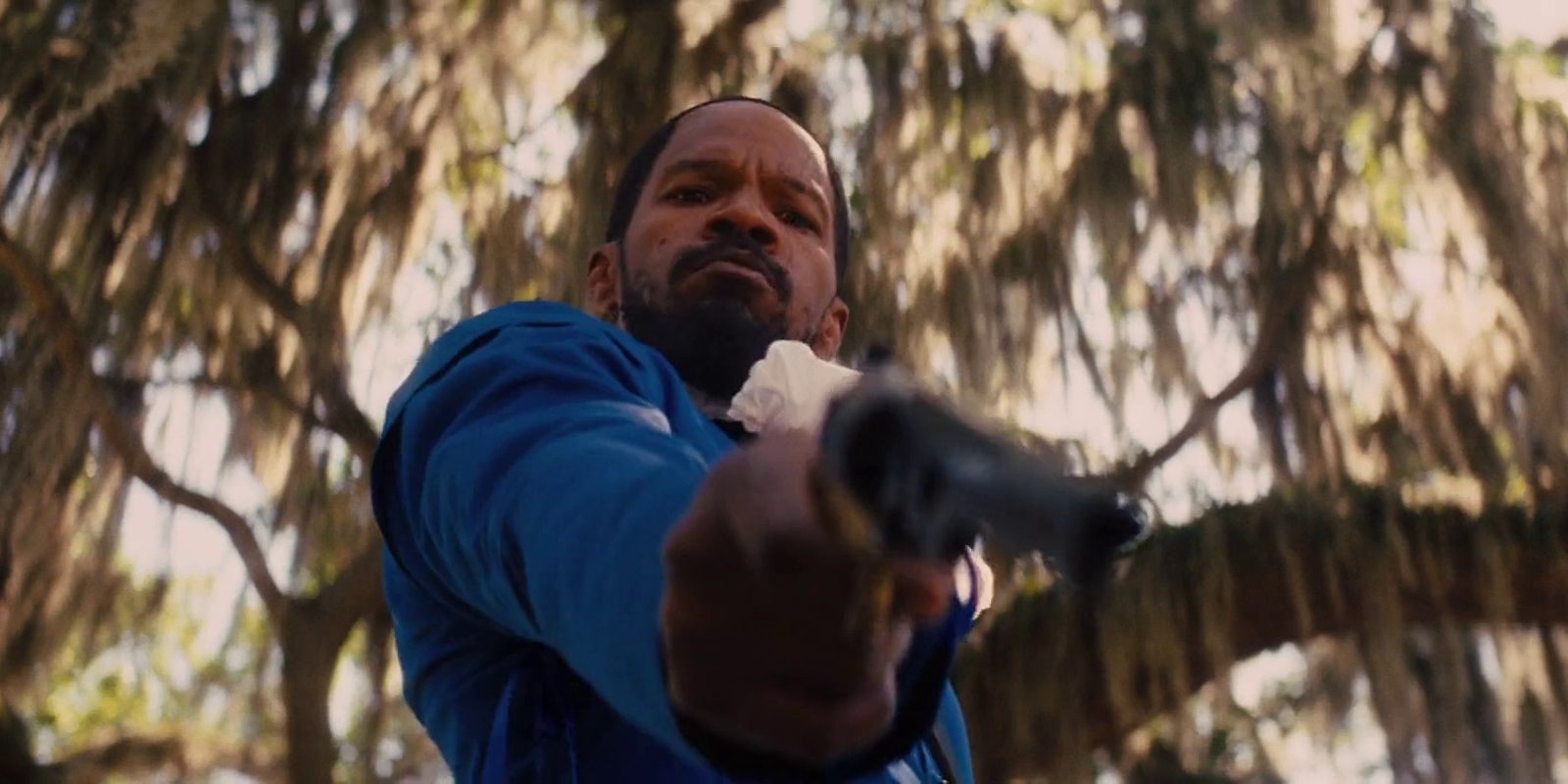 Jamie Foxx holding a gun in Django Unchained