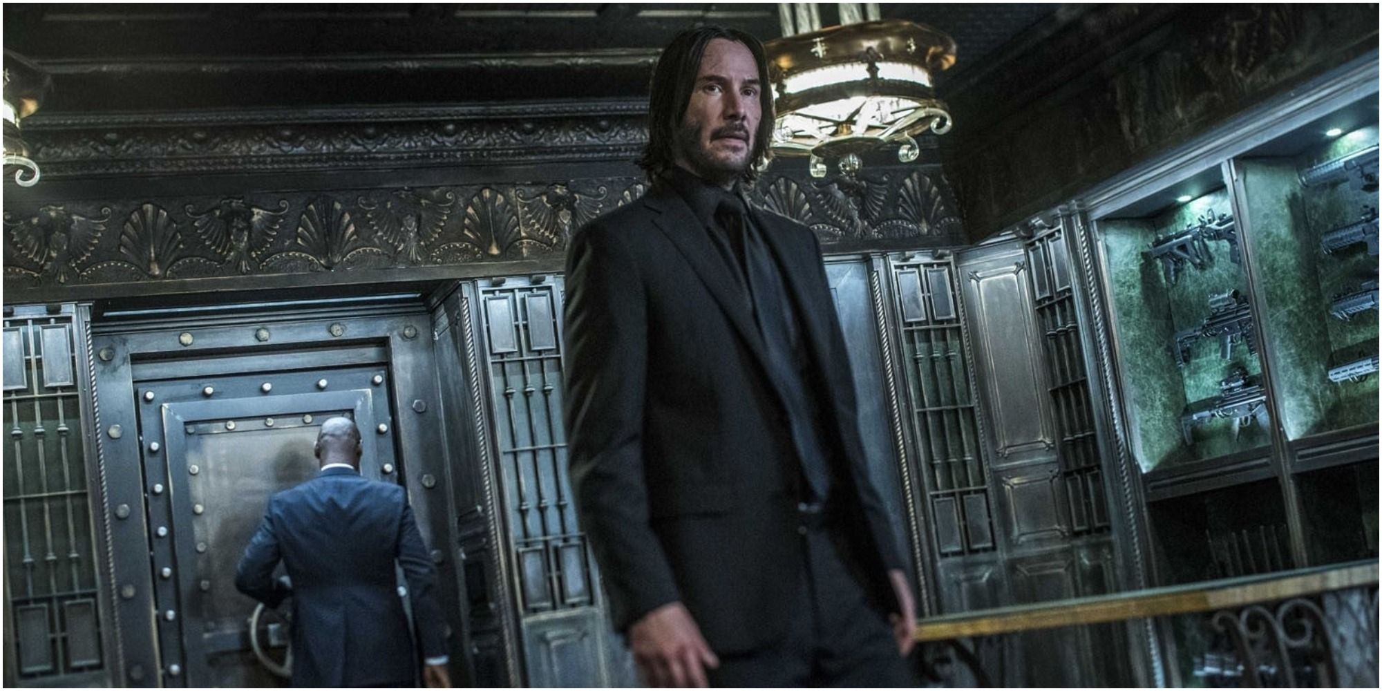 A screenshot of John Wick returning to the Continental in John Wick - Chapter 3: Parabellum