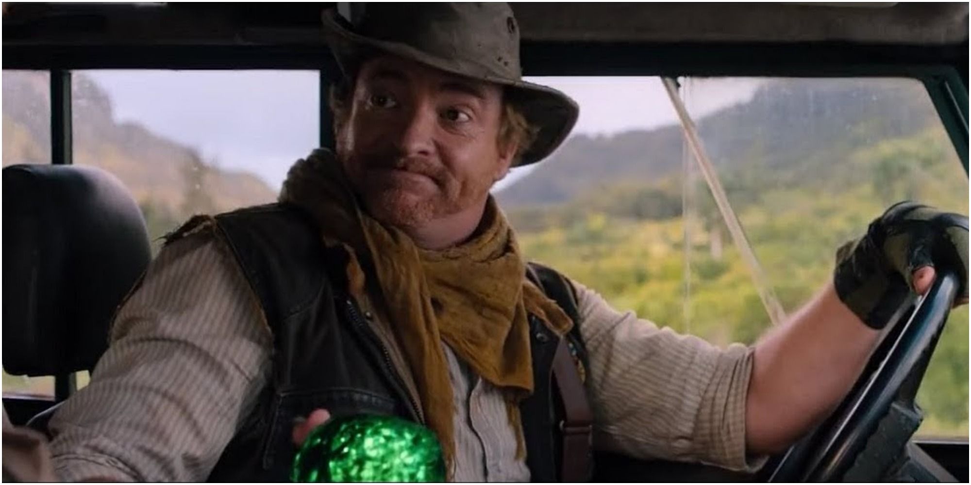 A screenshot of Rhys Darby's Nigel dropping off the gang and giving the Jaguar's Eye in Jumanji: Welcome to the Jungle