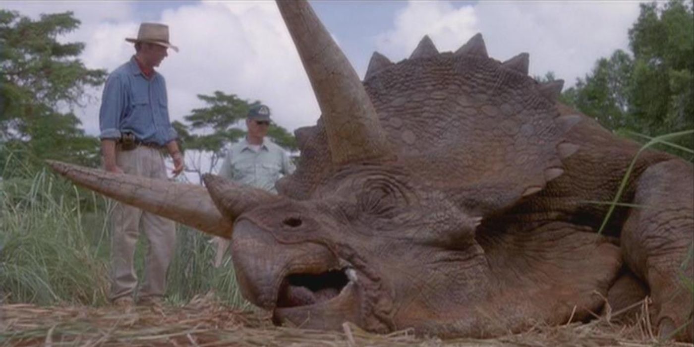 sick triceratops with Alan Grant in Jurassic Park