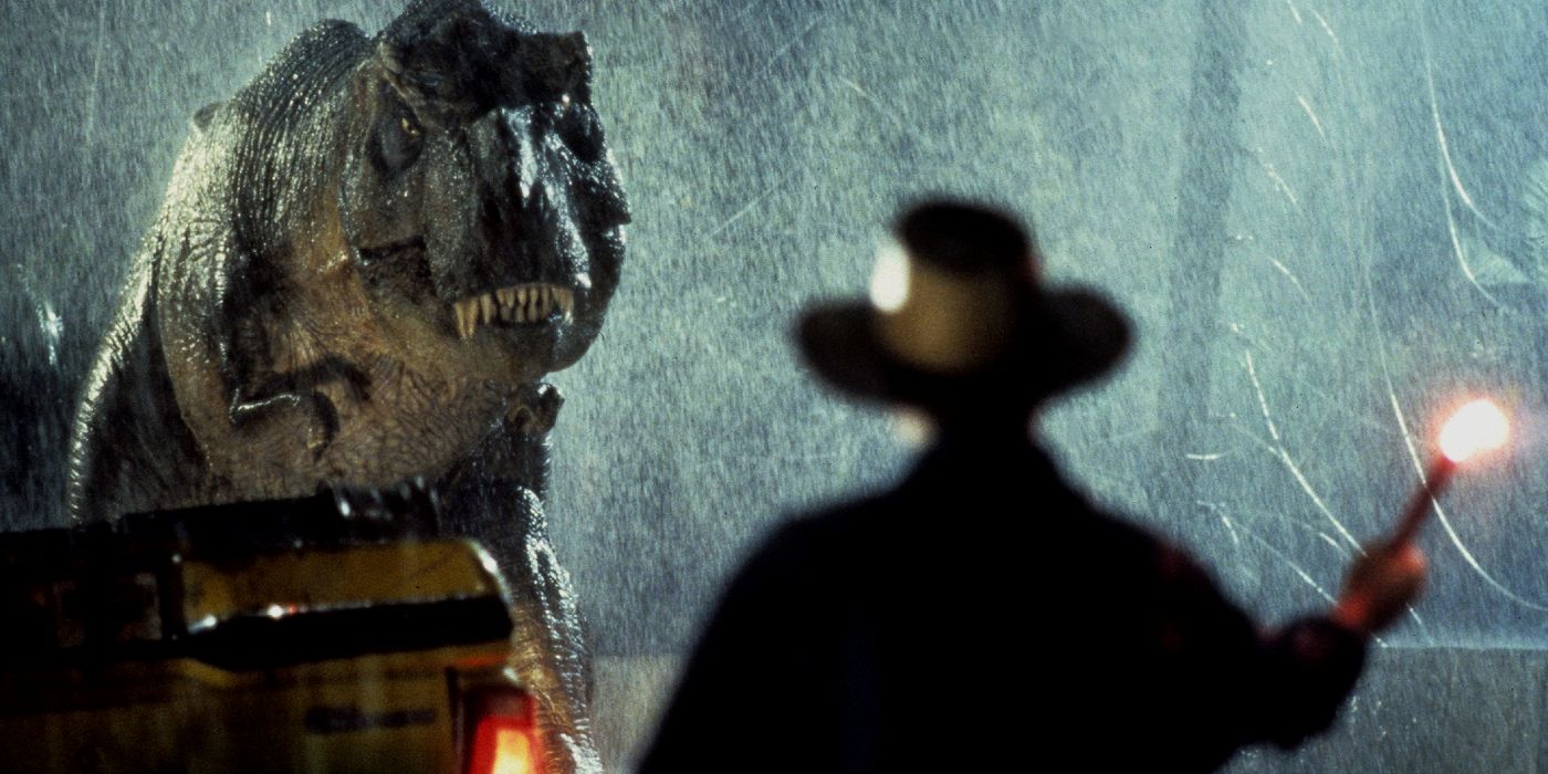 Alan Grant staring at the T-Rex and holding a flare in Jurassic Park (1993)