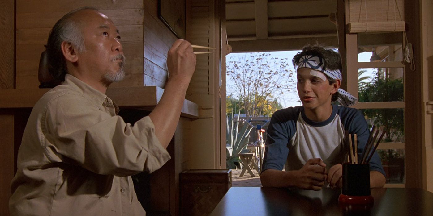 Miyagi tries to catch a fly with chopsticks in The Karate Kid