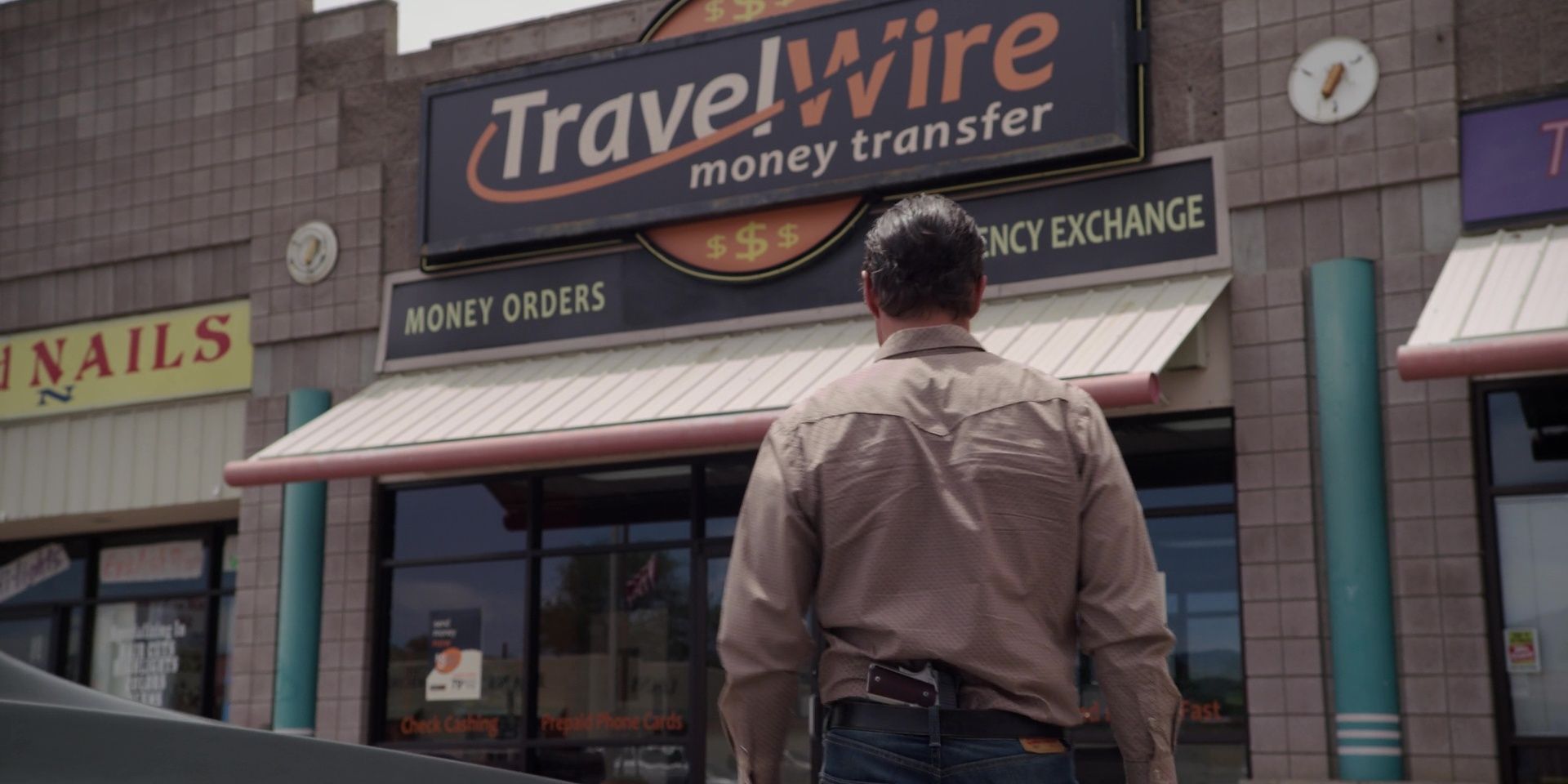 Lalo entering a TravelWire branch