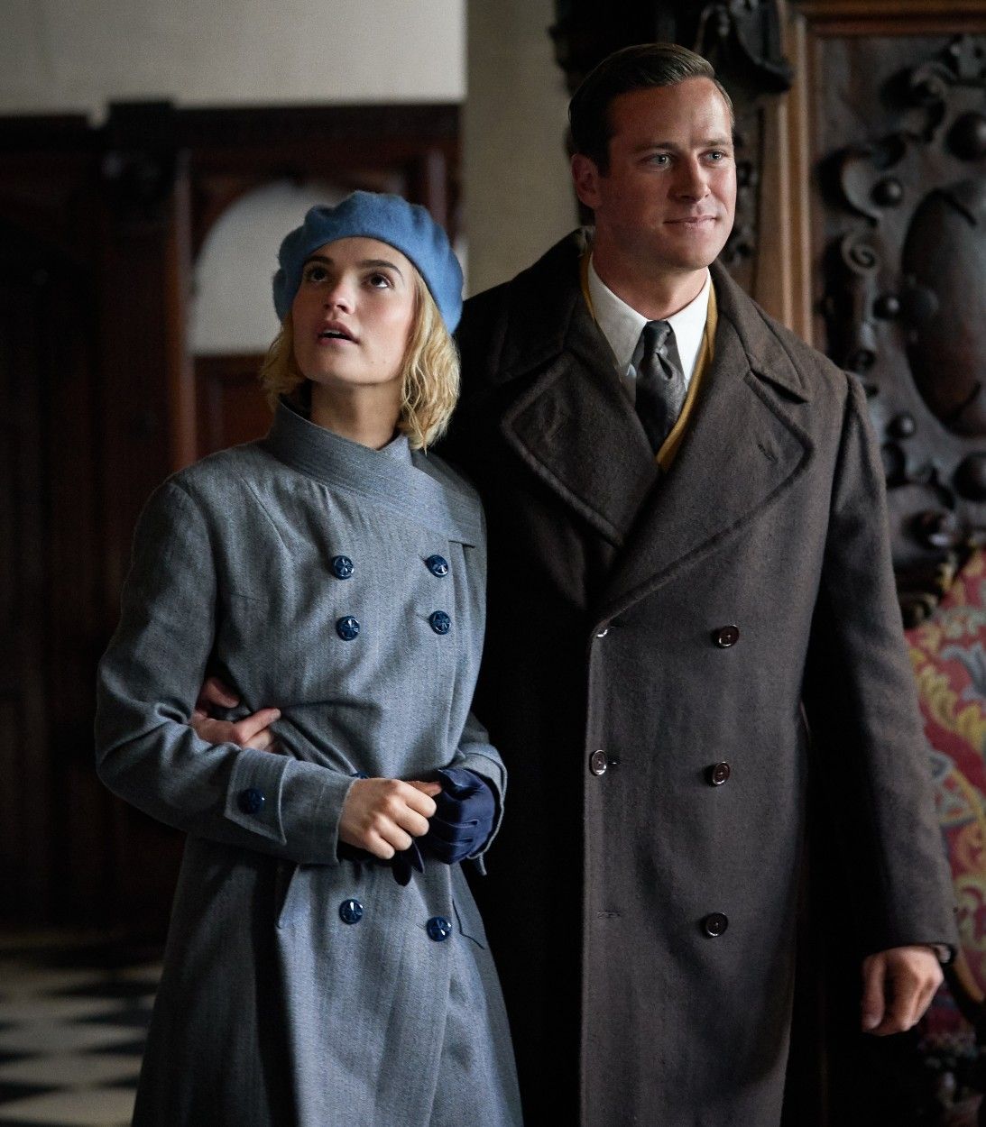 Lily James and Armie Hammer in Rebecca Vertical