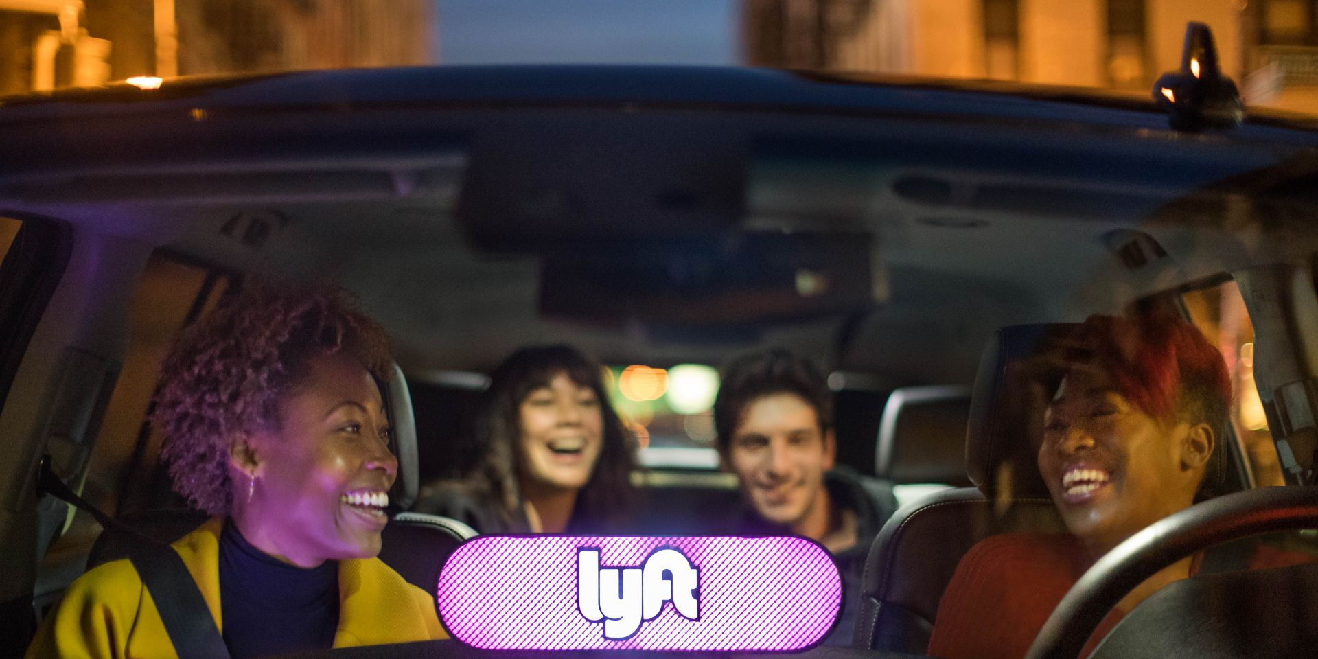 A group of people using Lyft