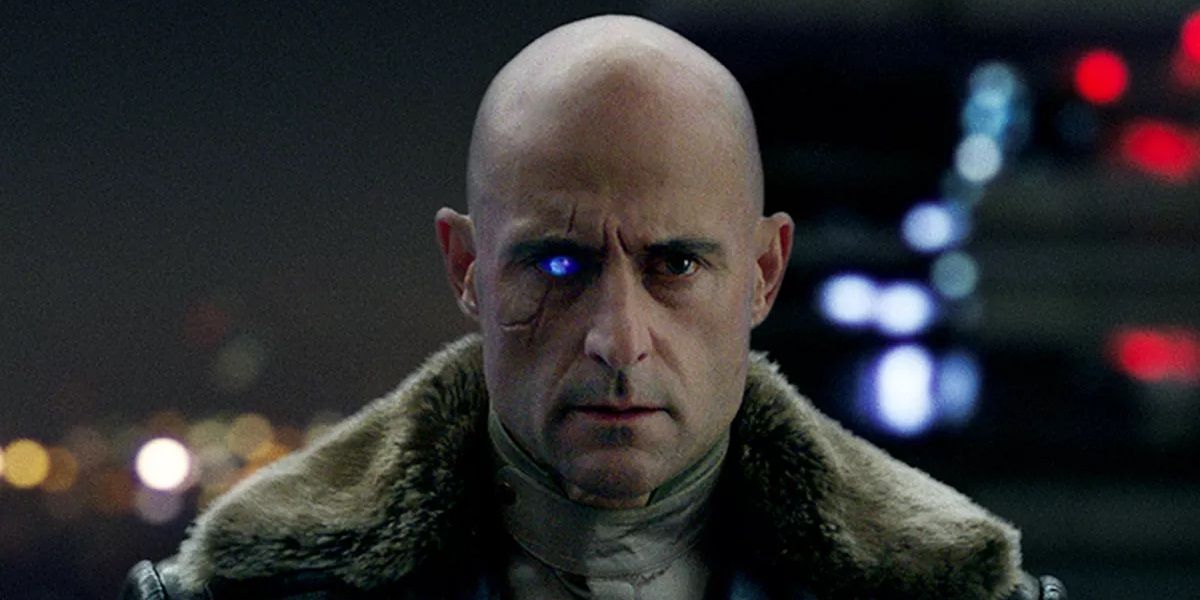 Mark Strong looking into the camera in Shazam