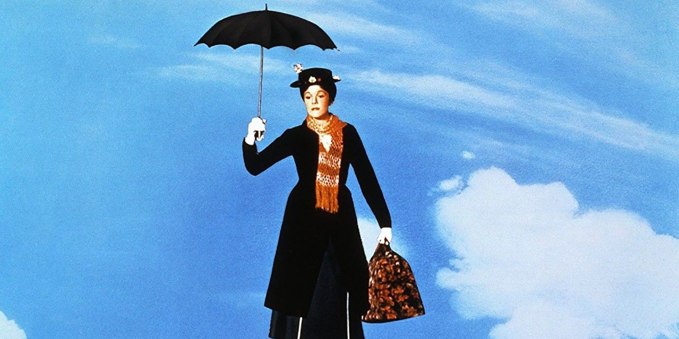 Mary Poppins flies down from the sky on her umbrella