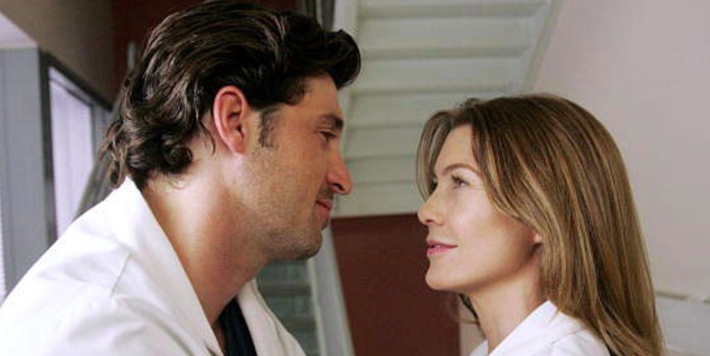 Meredith and Derek looking at each other on Grey's Anatomy