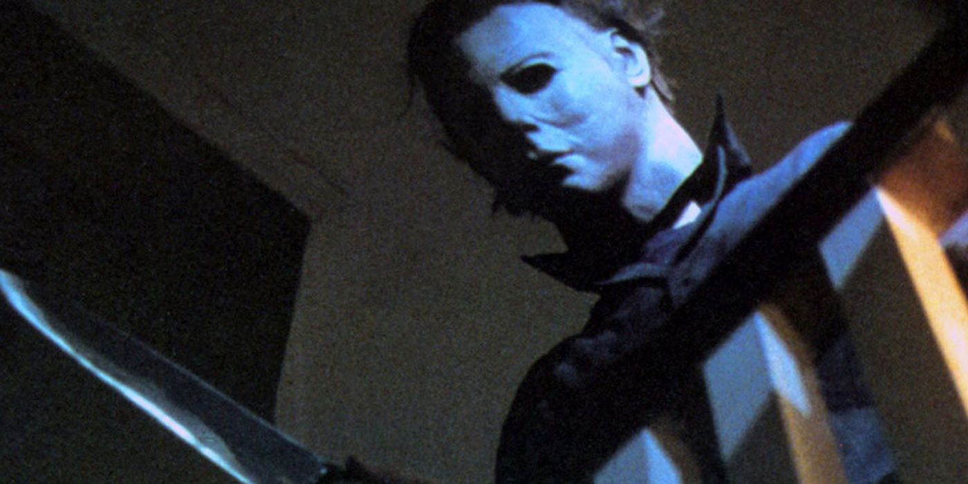 Michael Myers leans over a railing from Halloween