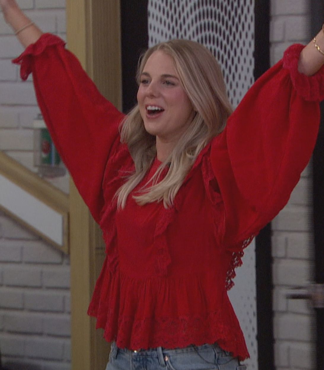Nicole Franzel on Big Brother 22 All Stars with her arms up vertical