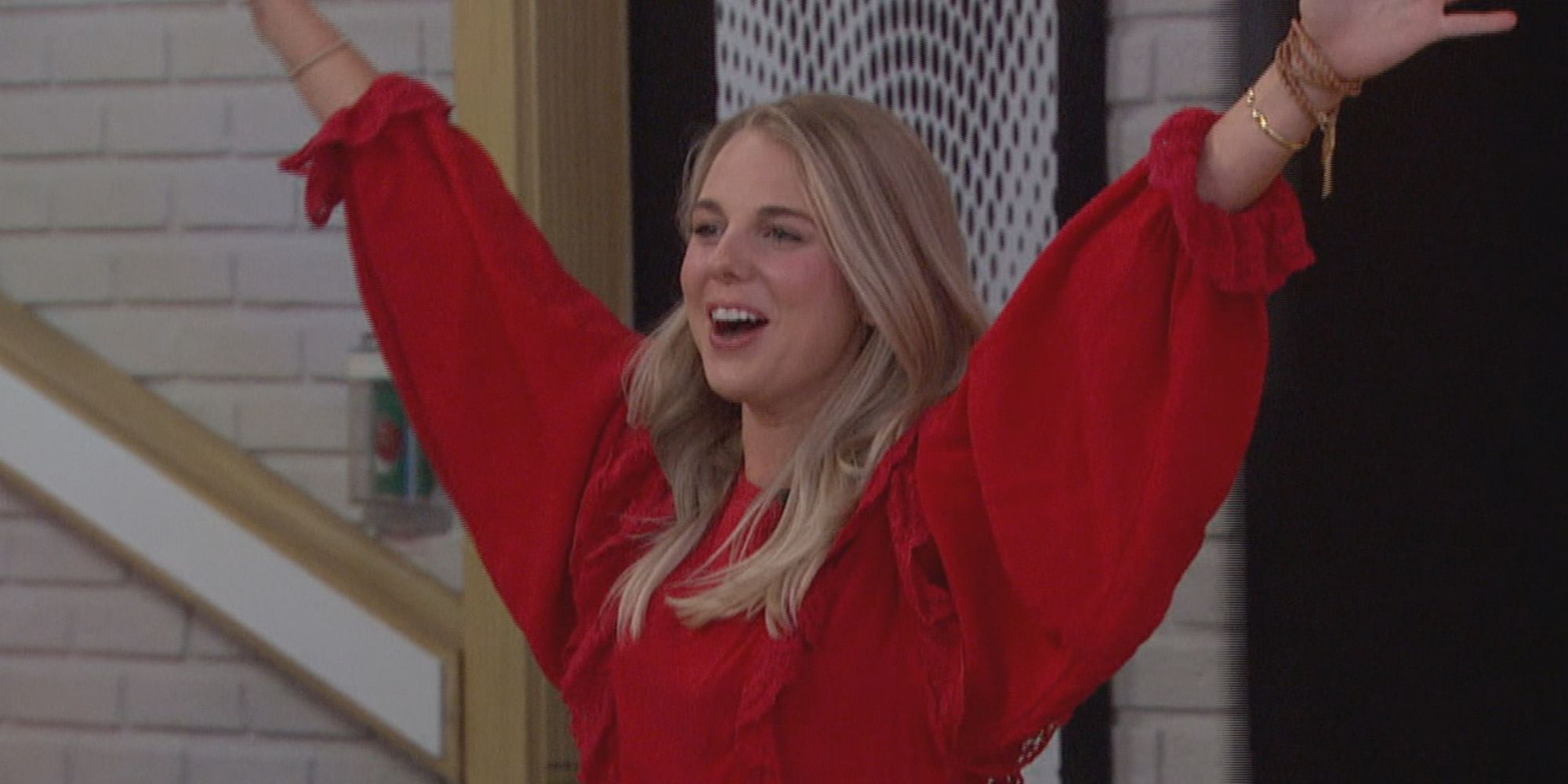 Nicole Franzel on Big Brother 22 All Stars with her arms up