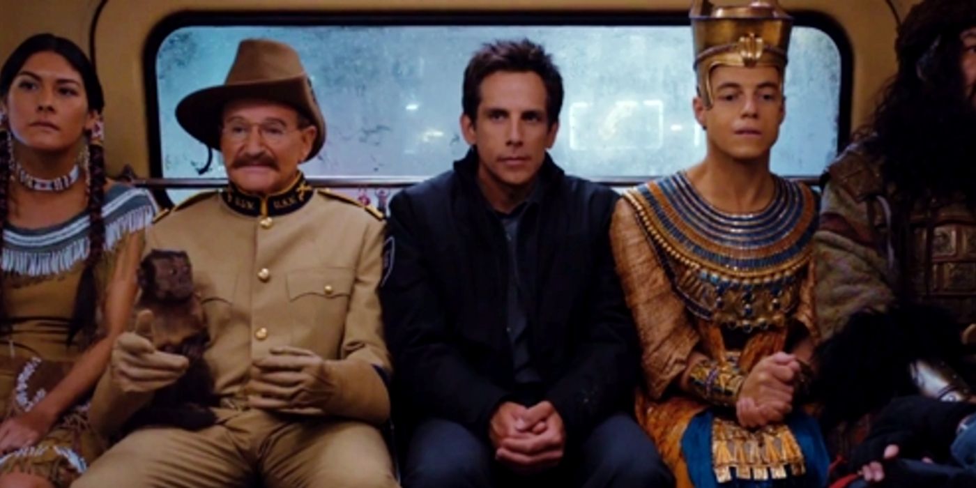 Larry sits at the back of a bus with Teddy Roosevelt and Ahkmanrah in Night at the Museum
