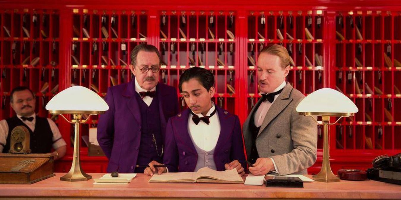 Owen Wilson and Tony Revolori in the lobby in The Grand Budapest Hotel