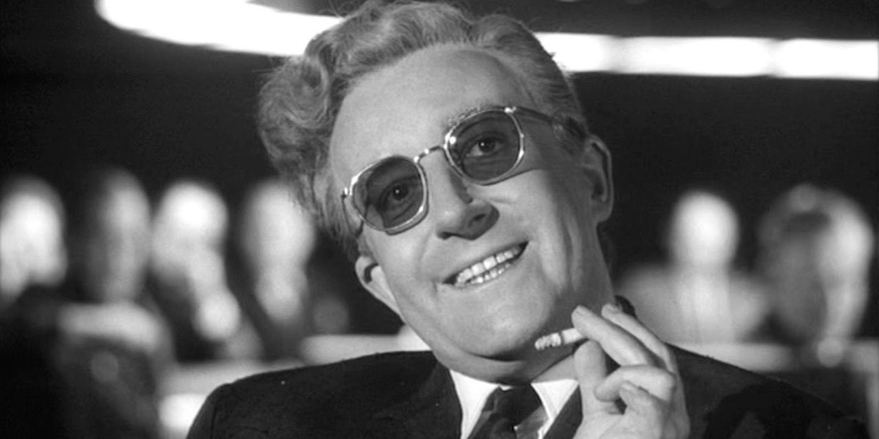 Dr Strangelove smokes a cigarette in the war room.