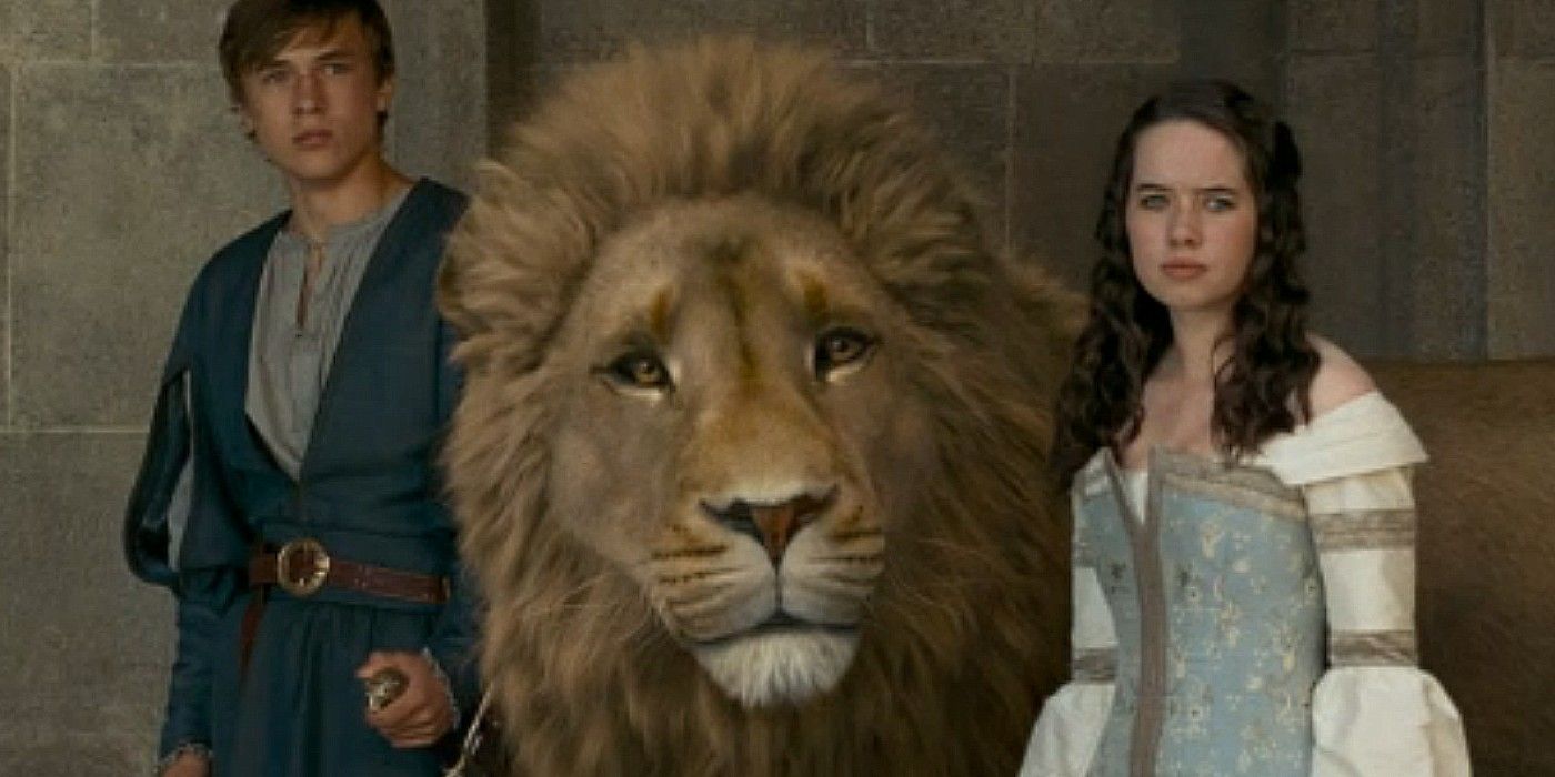 Peter and Susan with Aslan in The Chronicles Of Narnia