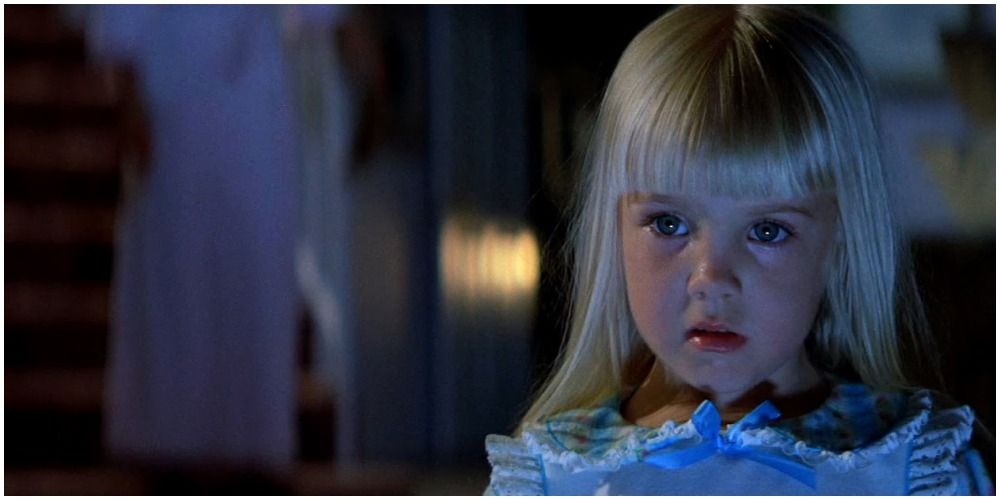 Little Girl Looking Into TV Screen