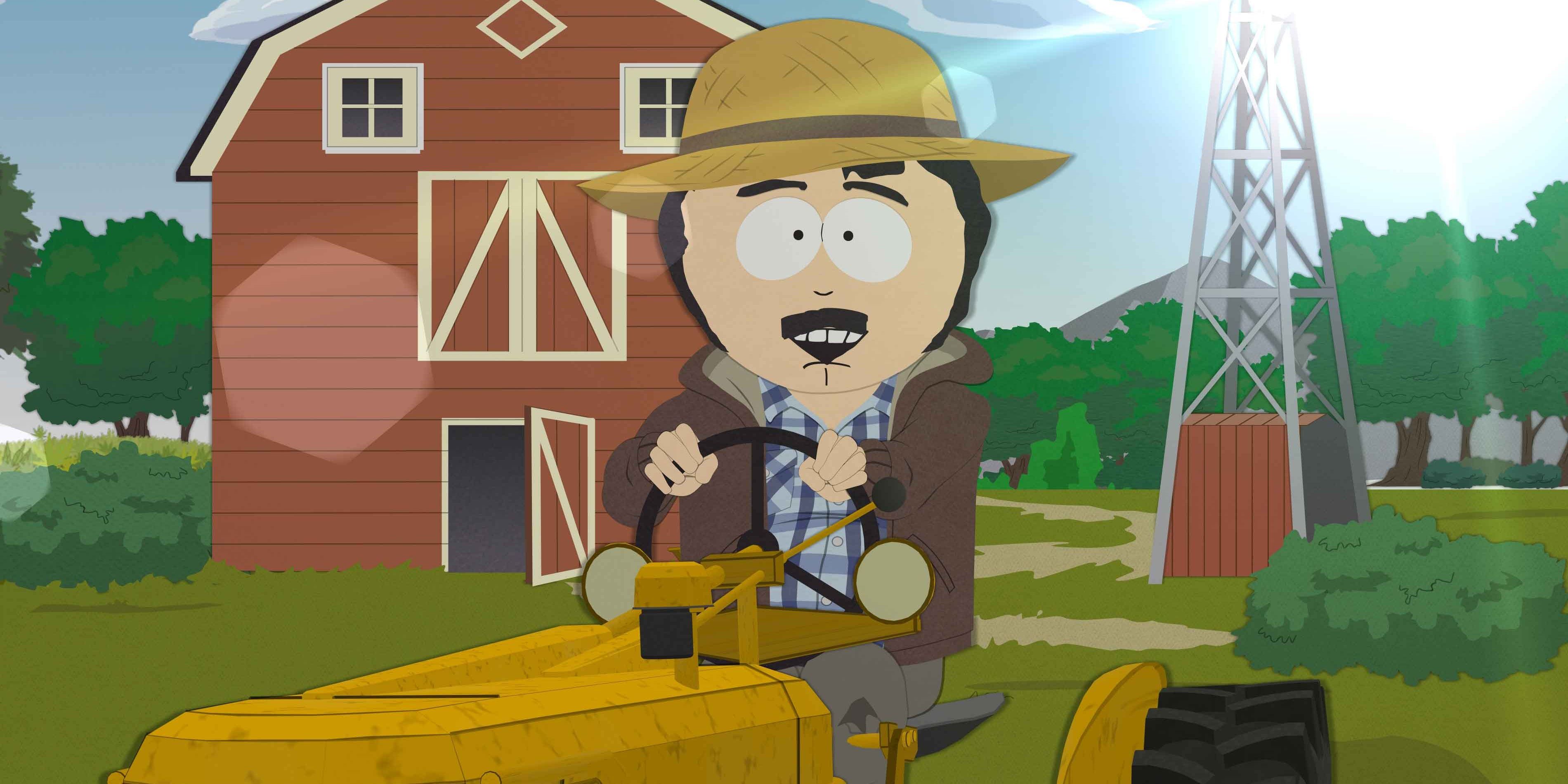 Randy in South Park outside a barn driving a tractor.