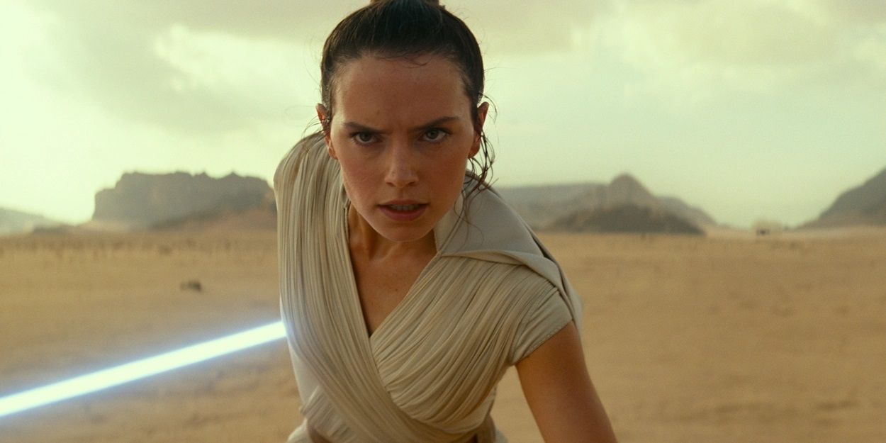 Rey holding her lightsaber in The Rise of Skywalker