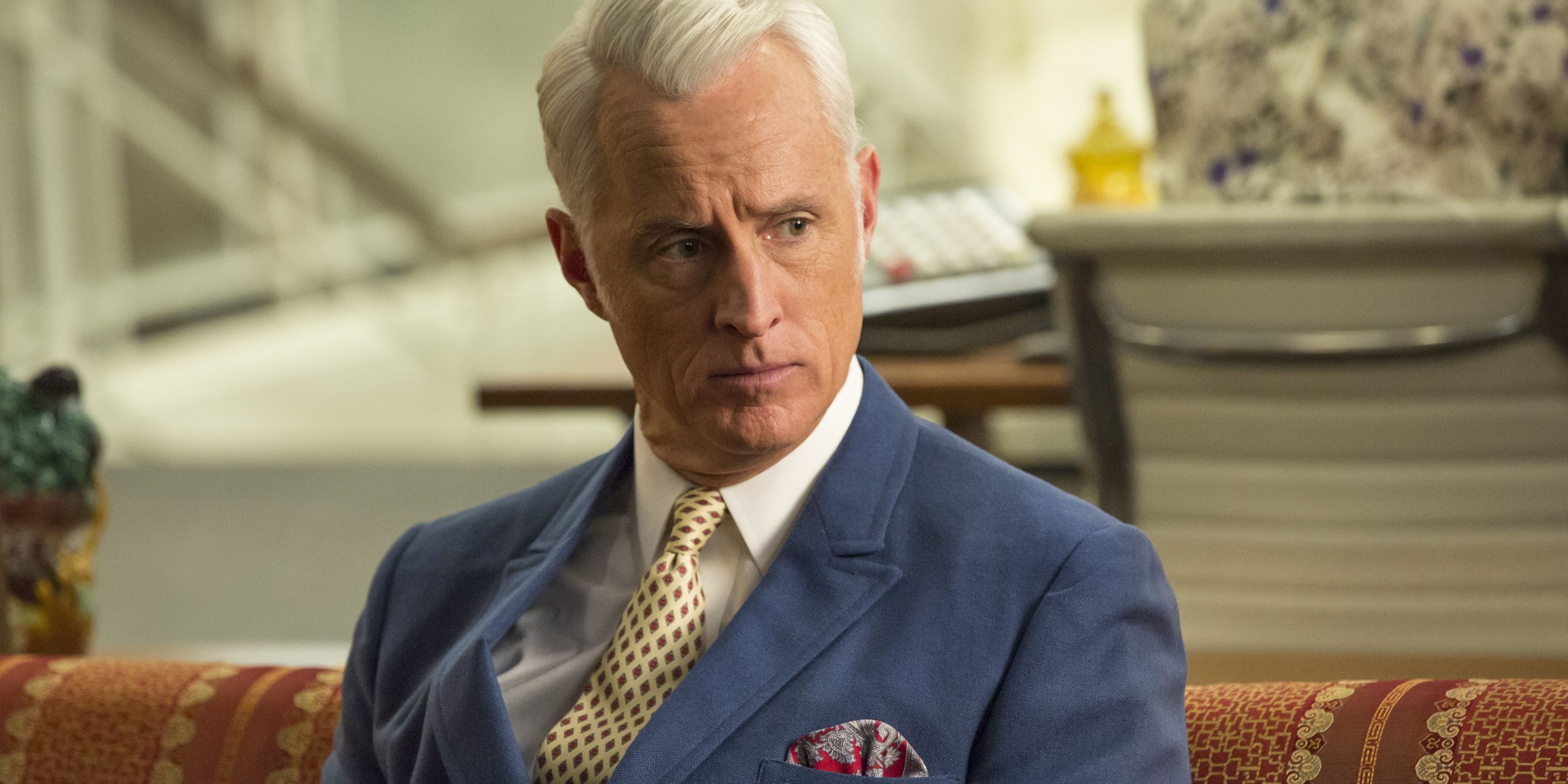 Roger Sterling looking serious in a suit on Mad Men