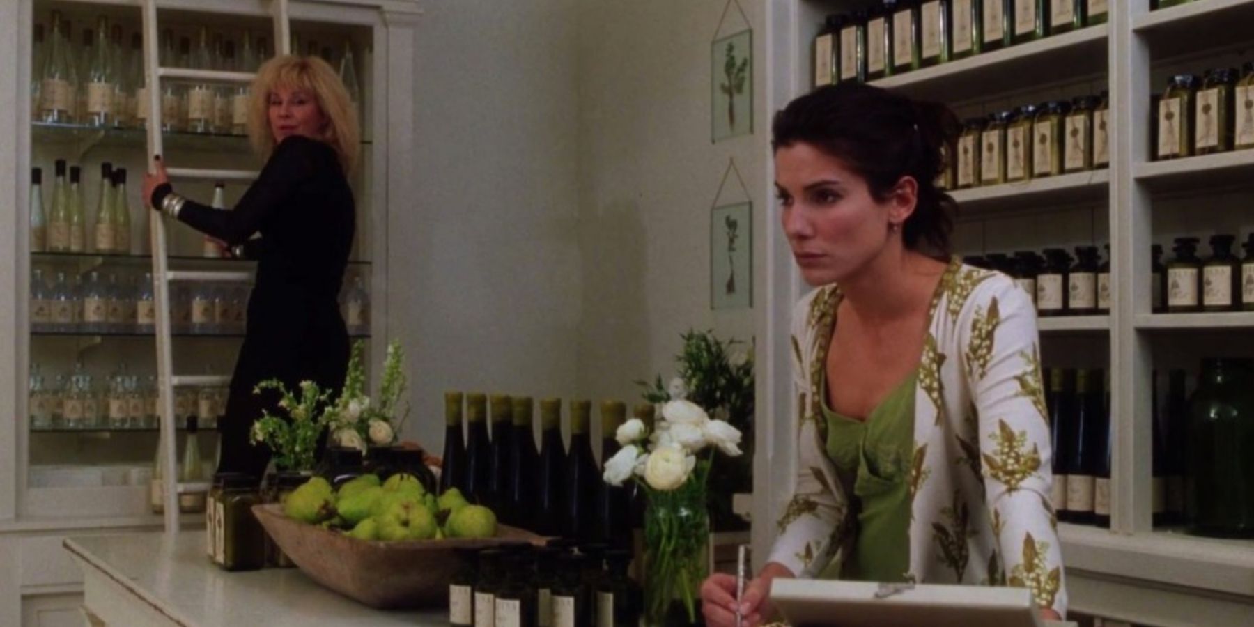 Sally stands at the counter of her shop in Practical Magic