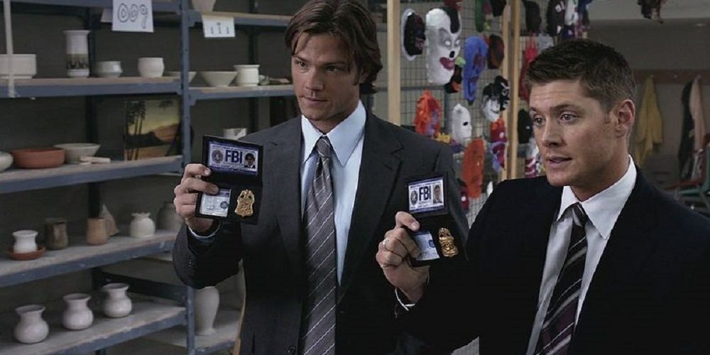 Sam and Dean show their badges