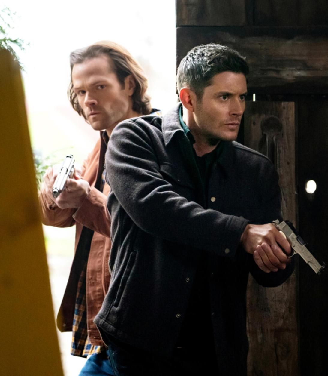 Sam and Dean with guns