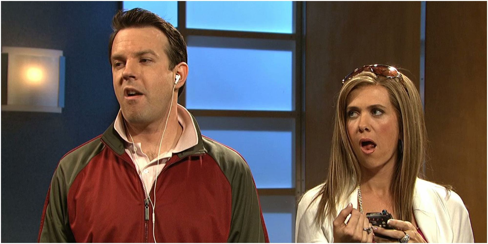 A screenshot of Jason Sudeikis and Kristen Wiig's Two A-Holes being ignorant in Saturday Night Live