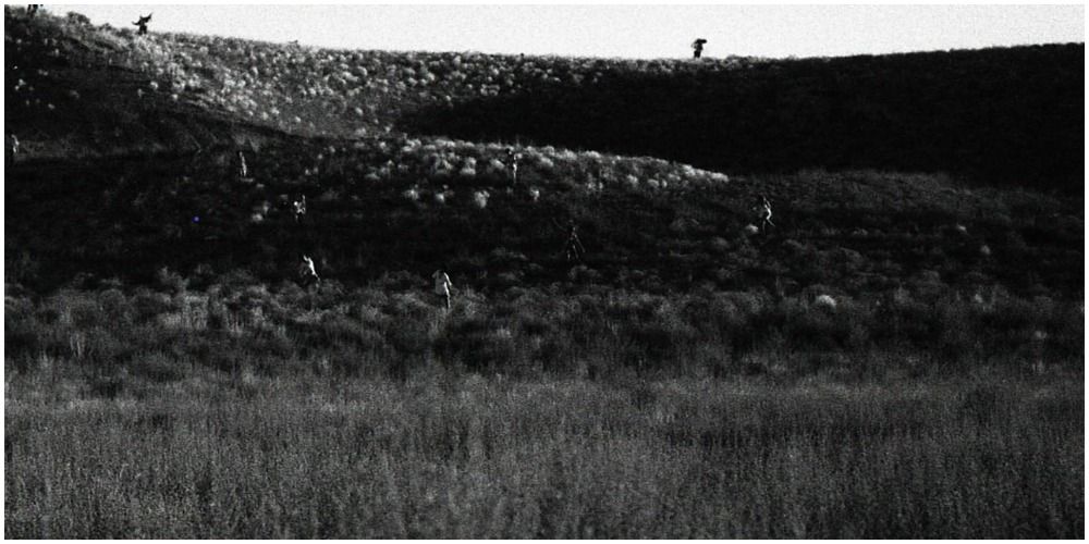 People Running Down A Hill