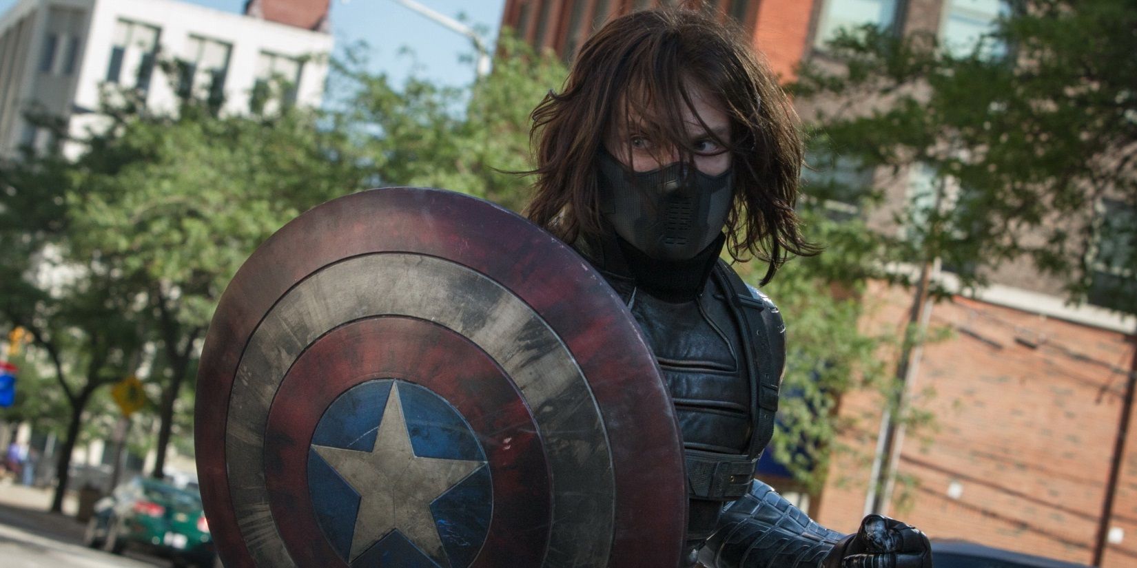 Bucky Barnes holding the shield in Captain America: The Winter Soldier