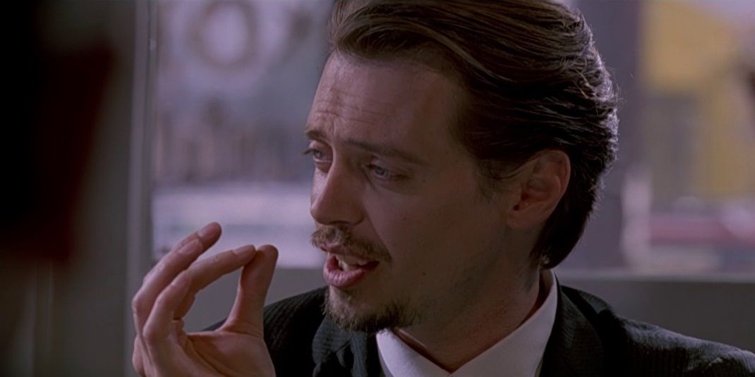 Steve Buscemi playing a tiny violin in Reservoir Dogs