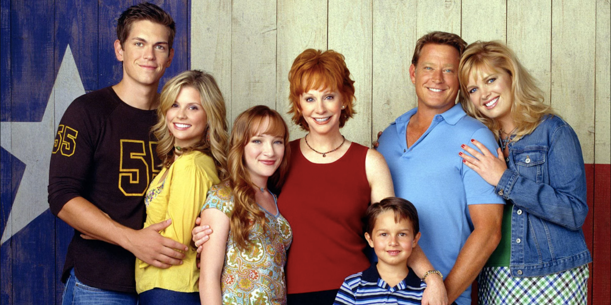 The cast of Reba standing together