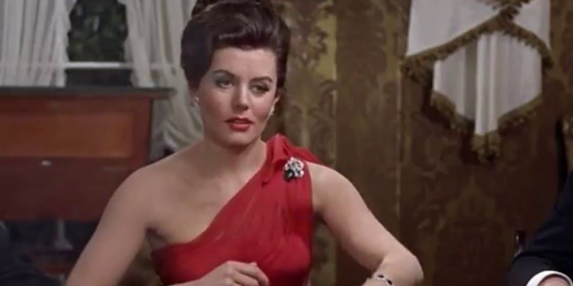 Sylvia Trench wearing a red dress in Dr No