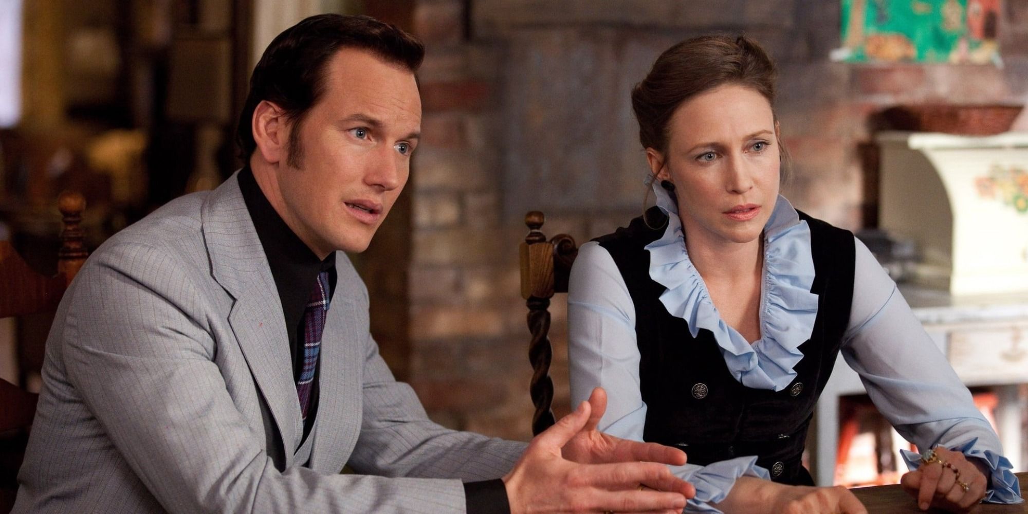 A screenshot of Ed and Lorraine Warren confronting the Perron family in The Conjuring