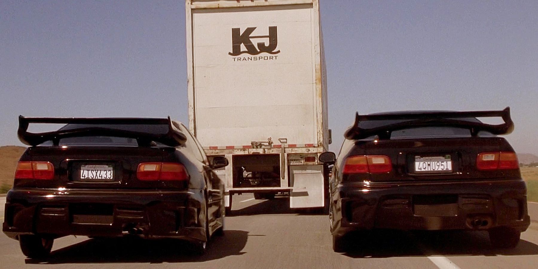 Dom's team conducts a DVD truck heist in The Fast and the Furious