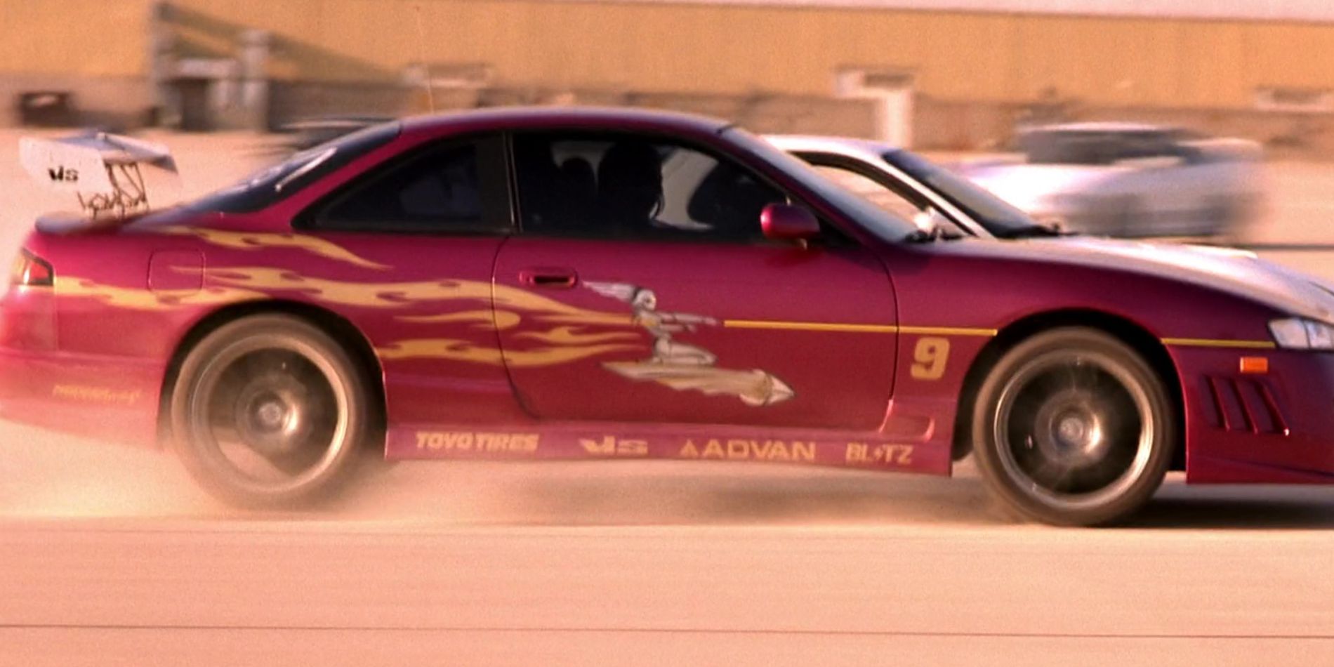 Letty (Michelle Rodriguez) racing in a Nissan 240sx in The Fast and the Furious