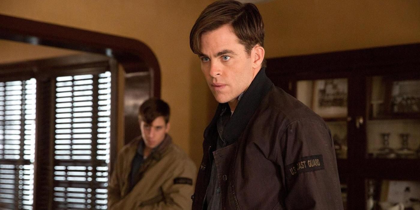Chris Pine in standing in an office in The Finest Hours