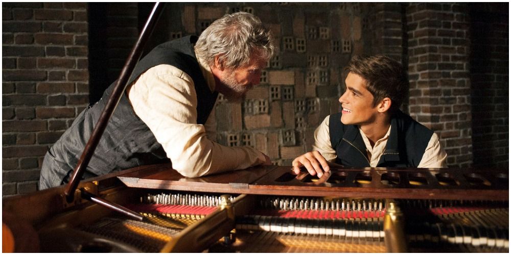 Young And Old Man At Piano